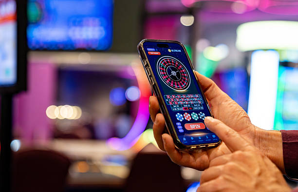 Live Texas Hold'em Bonus table with dealer and community cards displayed
