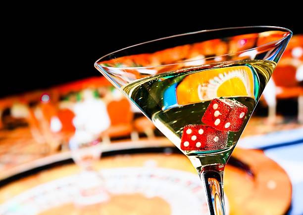 Dealer revealing community cards on Texas Hold'em Bonus table